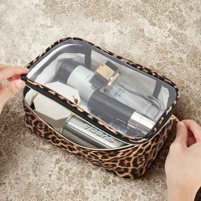 Femme ouvre trousse de toilette frmme grand format dessus transparent