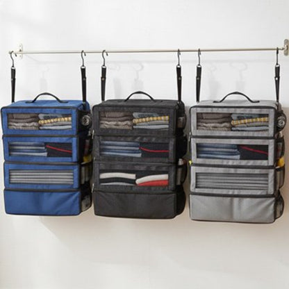 Organisateur de valise en trois couleurs noir bleu gris