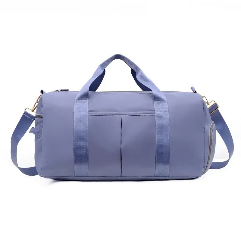 sac de voyage bleu a bandouliere porte epaule ou a la main