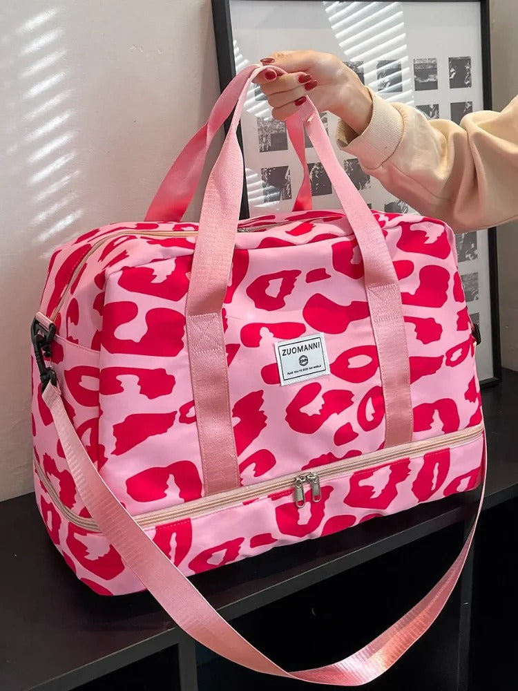 sac de voyage femme rose leopard avec sangle epaule
