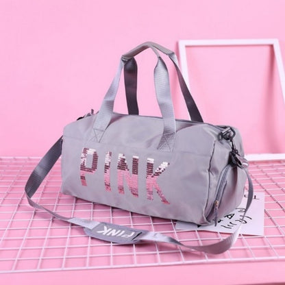 sac de voyage femme violet pink ecrit en paillete rose