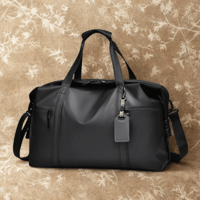 sac de voyage homme noir avec deux poches frontales zippees