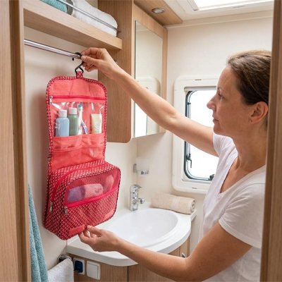 Trousse de toilette voyage rouge avec poches transparentes: